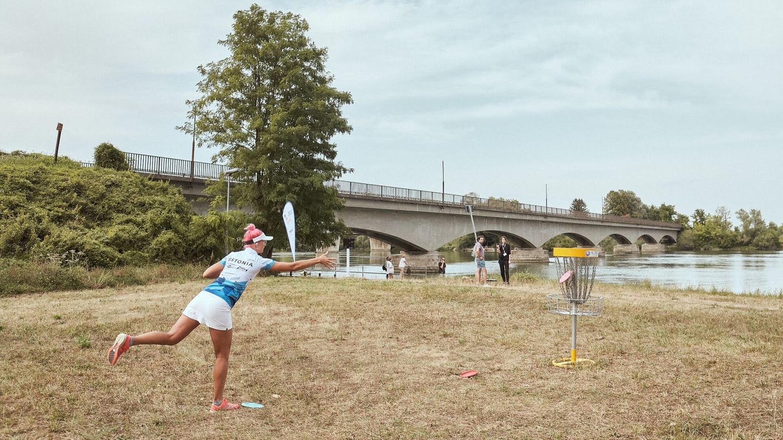 Player throwing a drive at the 2022 World Team Disc Golf Championship